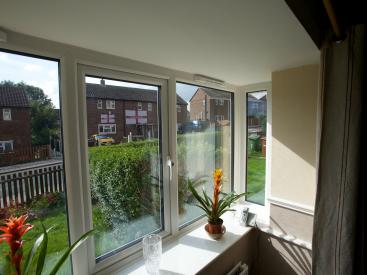 Large window cills are provided by window boxes in the external wall insulation